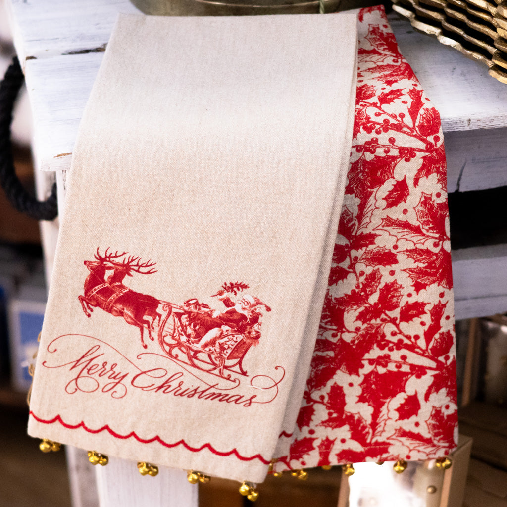 Christmas hand towel, beige with red Santa on sleigh and gold jingle bell trim