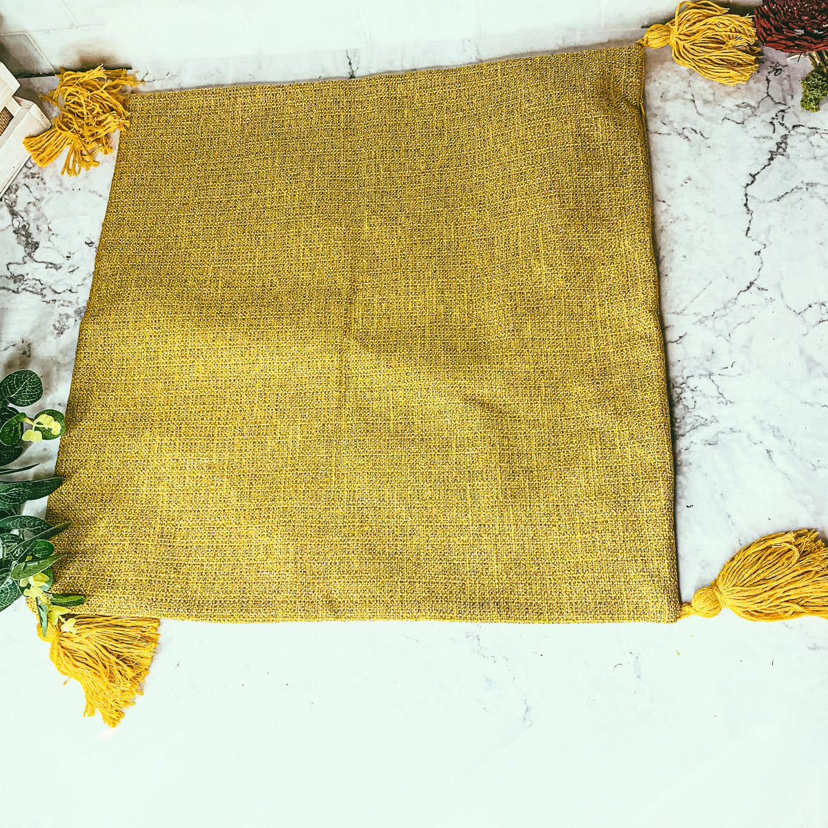 Boho cottage pillow case in gold yellow with tassel fringe on edges.