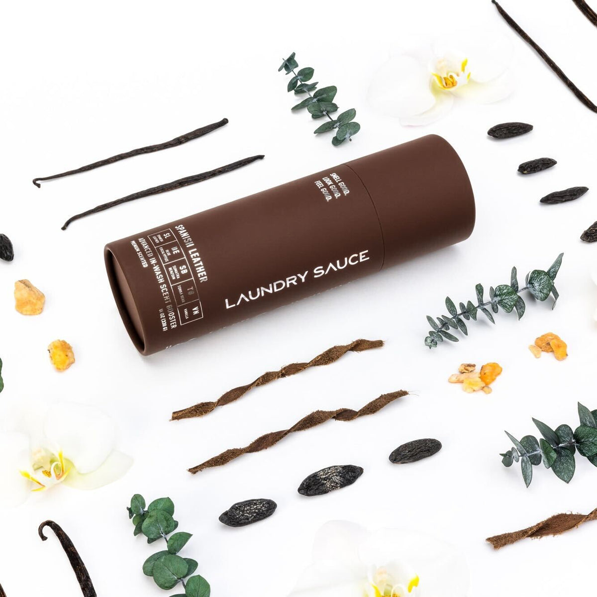 Laundry scent booster tube, dark brown with printed label and flip-top cap