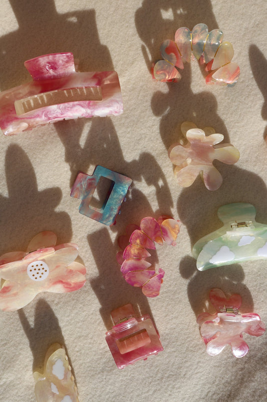 Color-changing translucent claw-shaped charms, pink, clear, and multicolor set