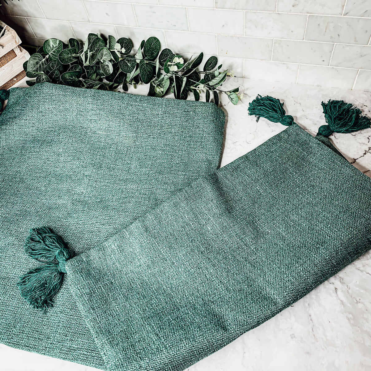 Boho cottage pillow case set in teal green with small tassel corners.