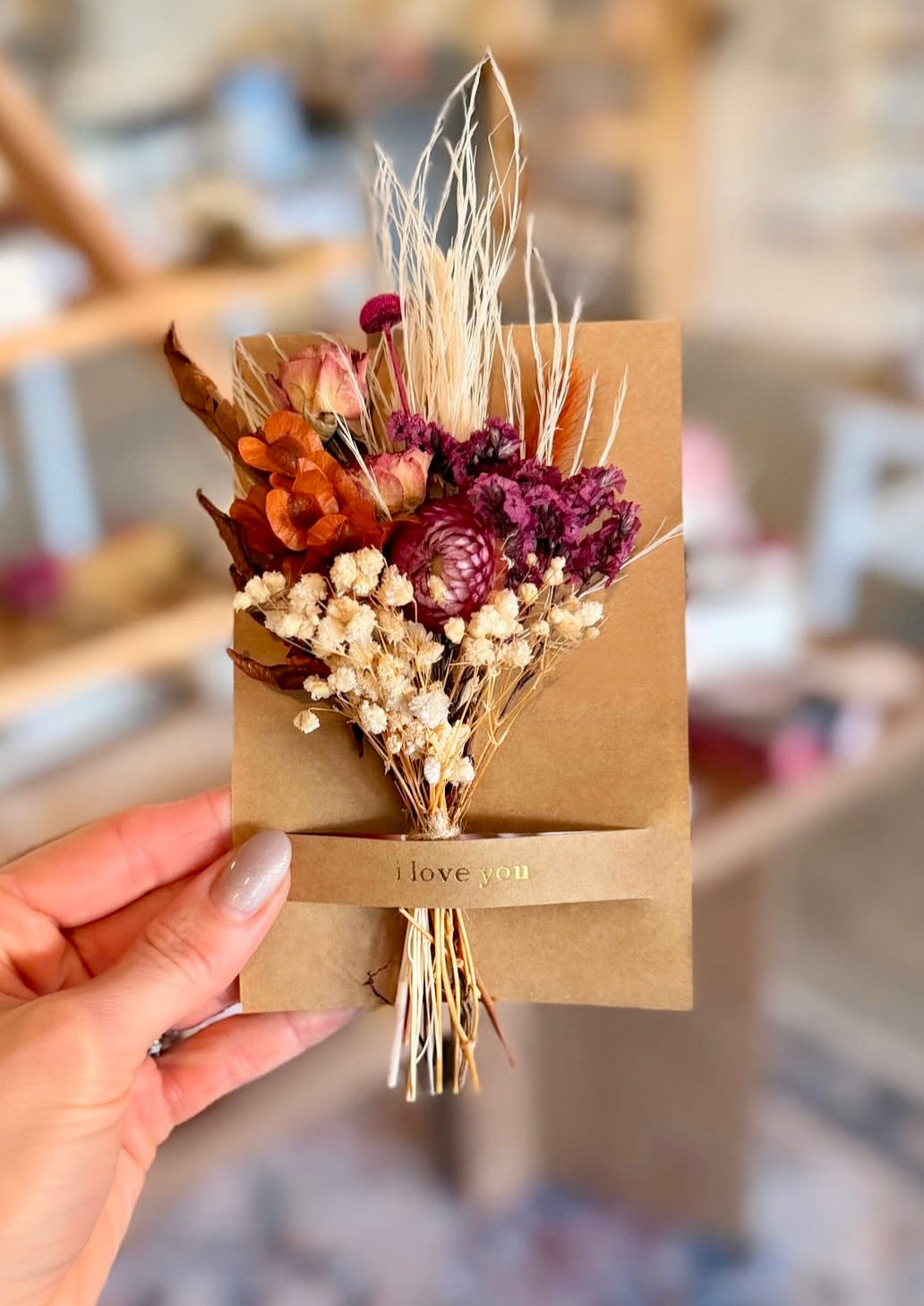 Kraft love you mini bouquet card with orange, magenta, and wheat dried florals