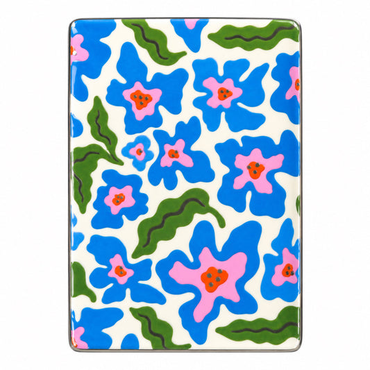 Square porcelain dice dish with colorful blue, pink, and green floral pattern