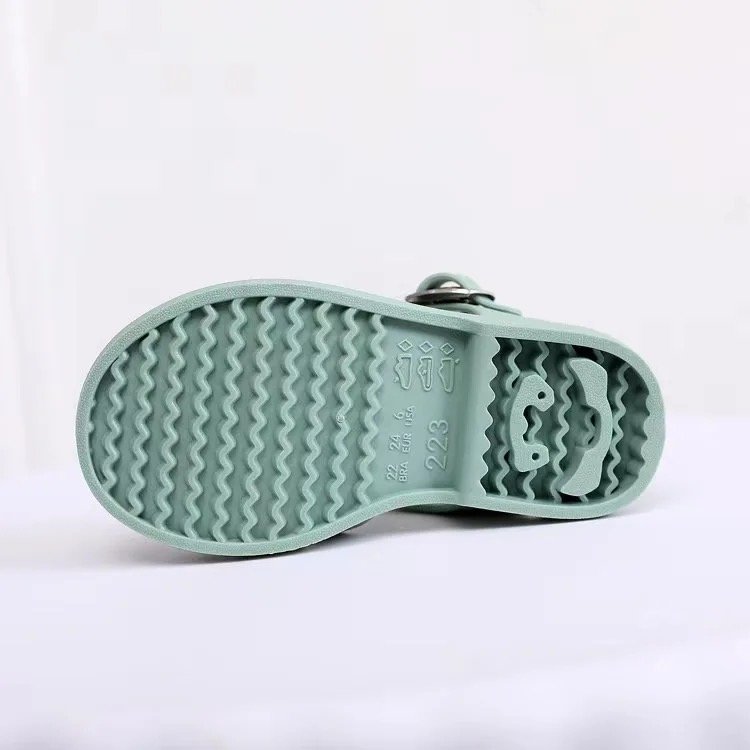 Kids' mint jelly sandals outsole with textured tread and heel strap