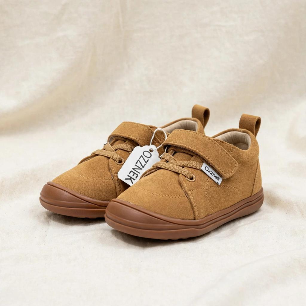 Kids' tan suede lace-up barefoot sneakers with flexible rubber sole