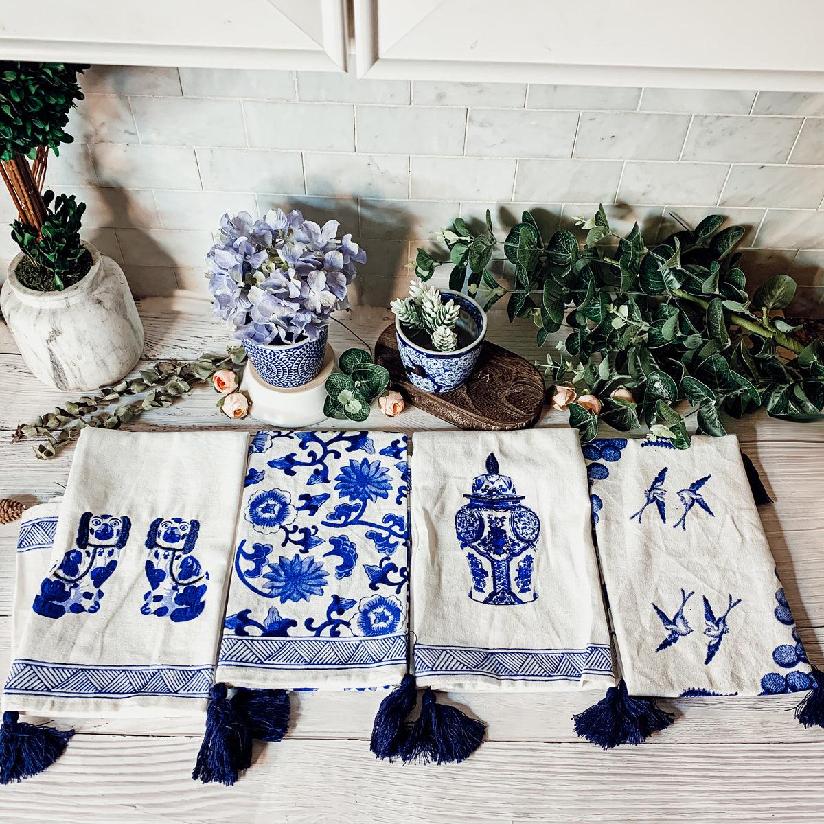 Chinoiserie tea towel set with blue-and-white designs and tassel fringes