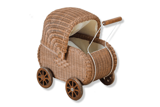 Brown rattan doll pram with curved canopy, cream lining, metal handle and wooden-spoke wheels