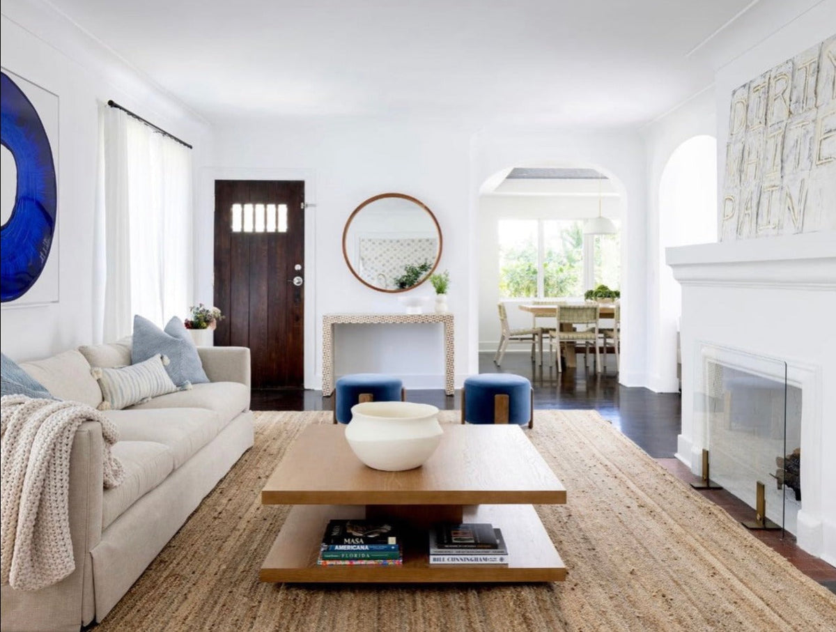 Living room scene with blue striped throw pillow on a couch