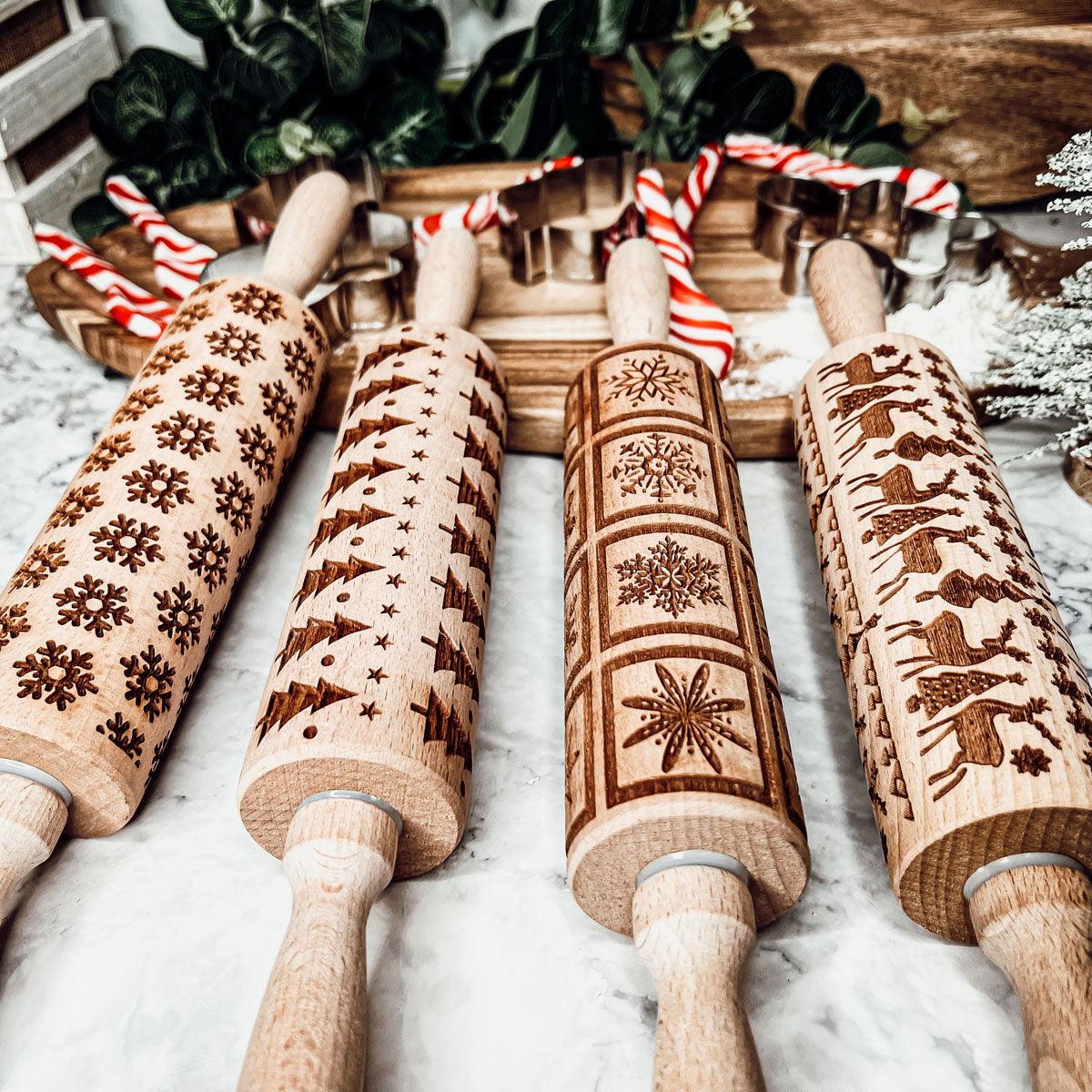 Christmas rolling pin set with 10 wooden roller designs in festive brown patterns