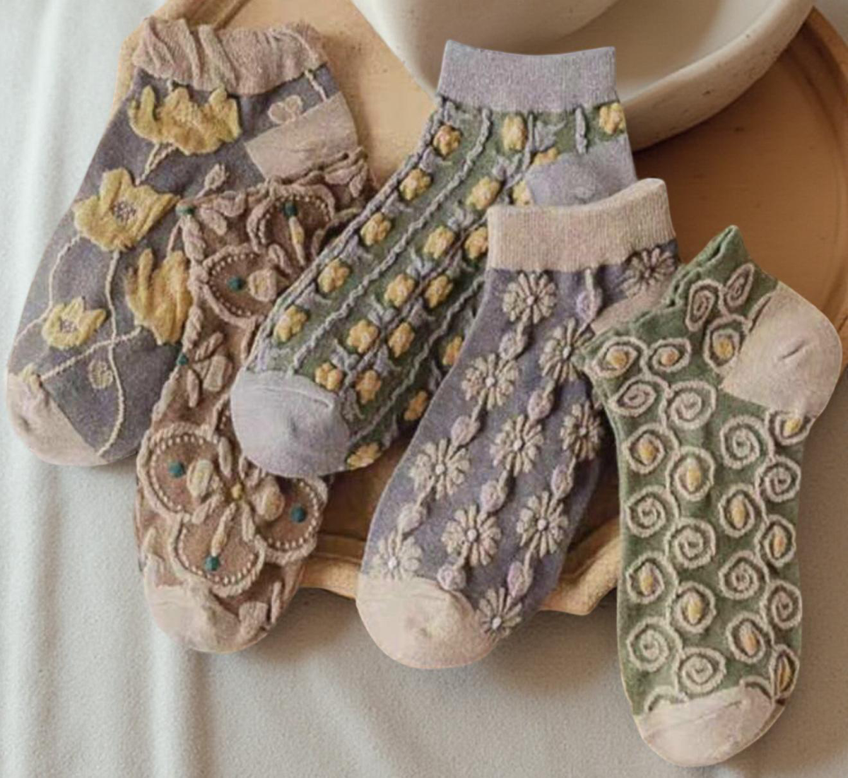 5-pack women’s ankle socks in gray with embroidered floral and swirl patterns