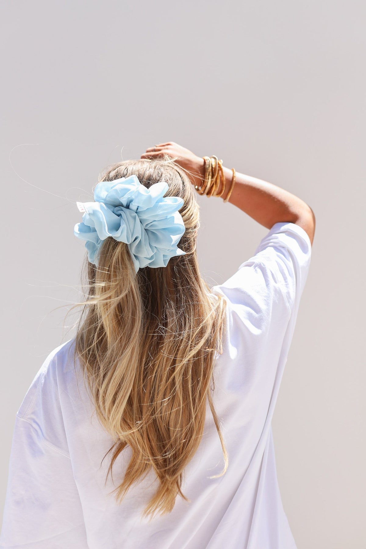 Jumbo scrunchie in light blue, gathered ruffle flower style
