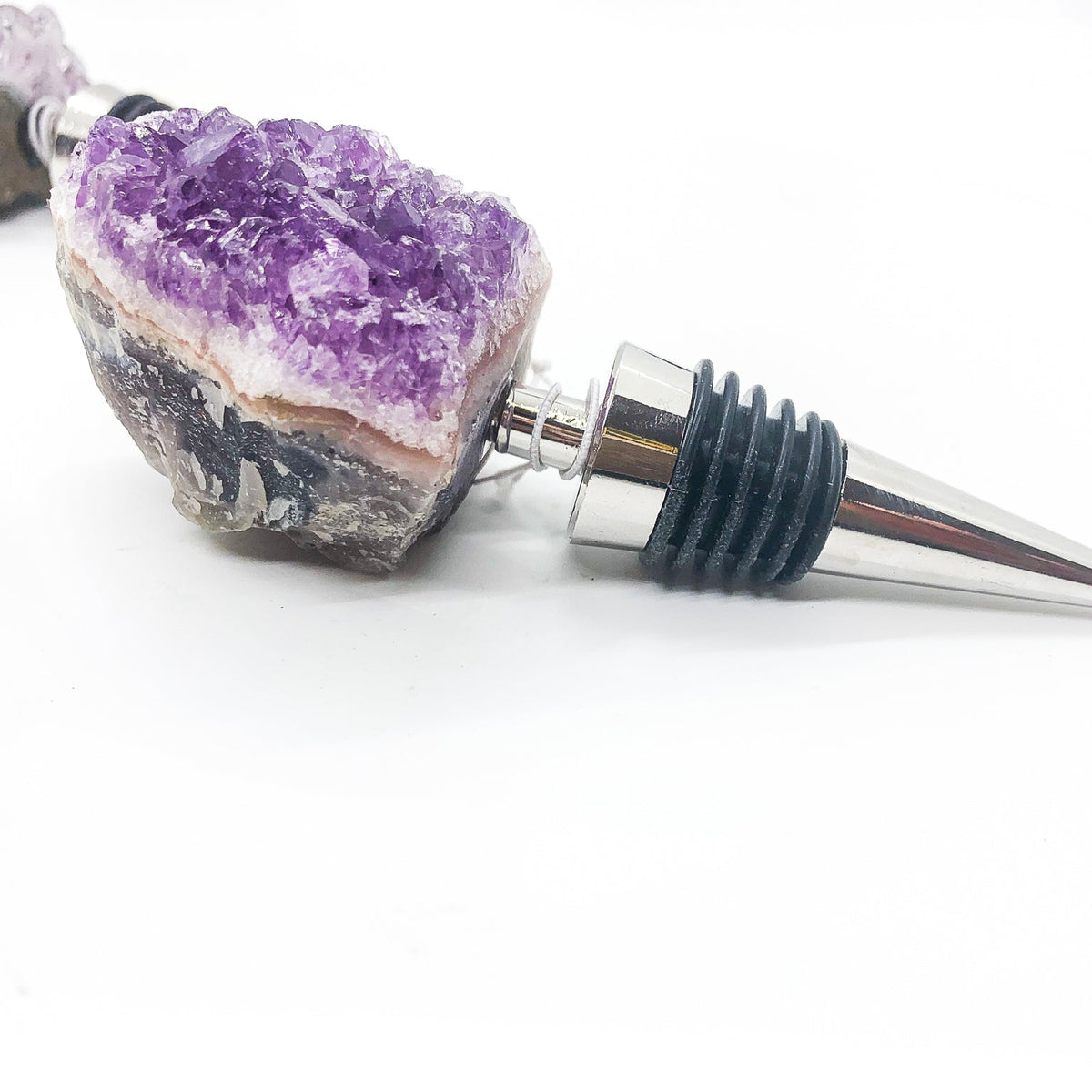 Naturally Bougie amethyst-style crystal bottle stopper with chrome metal cone and black ribs