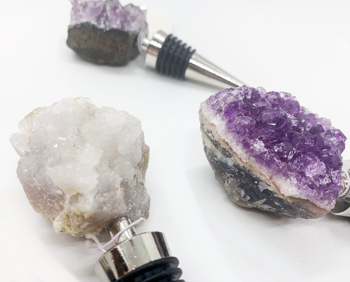 Naturally Bougie crystal bottle stopper with purple geode-like rock and silver tip