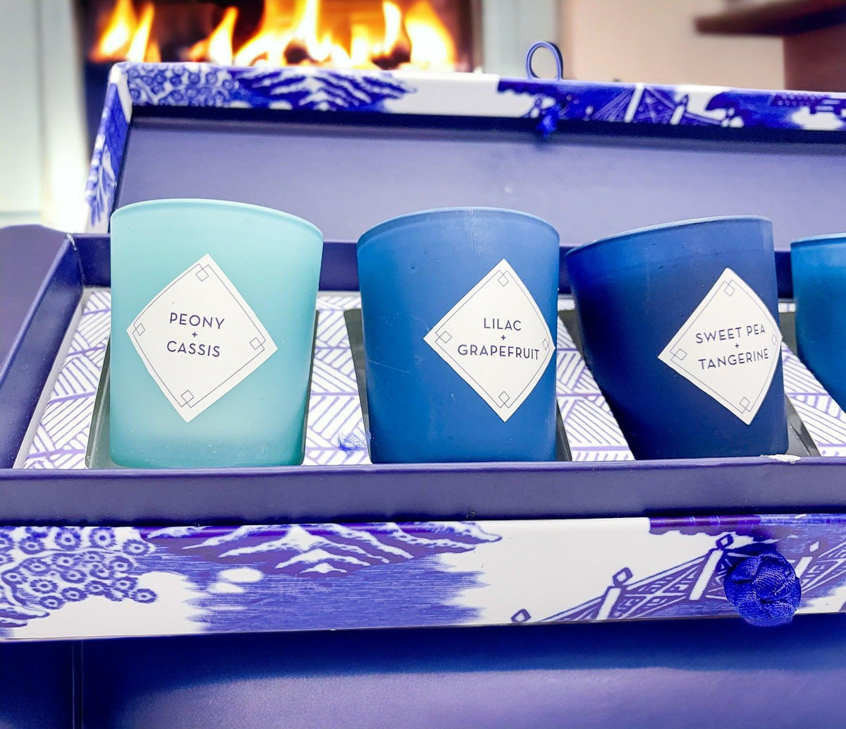 Mediterranean candle gift set in open blue box with four teal and blue candles