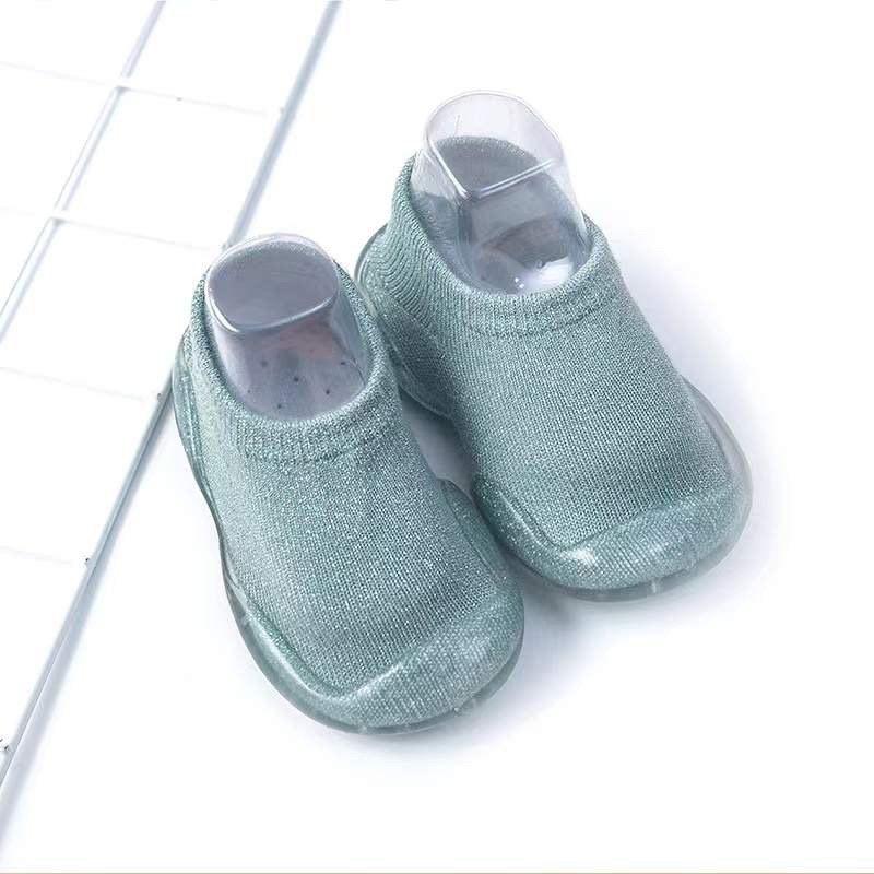 Teal baby sock shoes with clear soles, knit upper, rounded toe