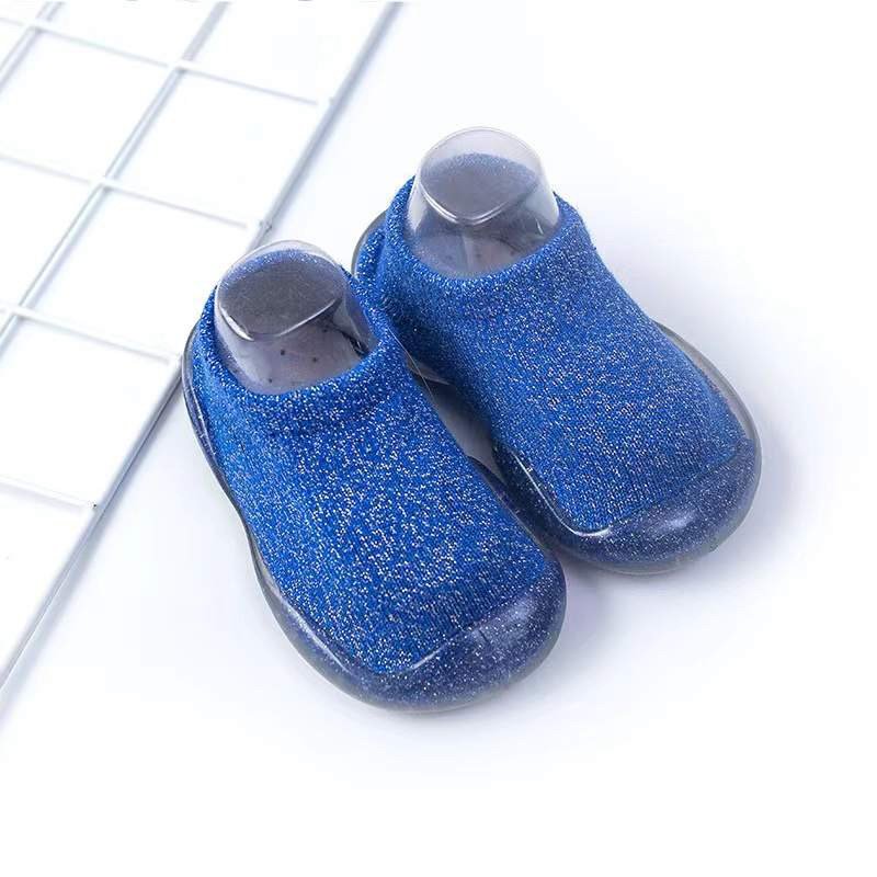 Royal blue baby sock shoes with clear soles, knit upper, rounded toe