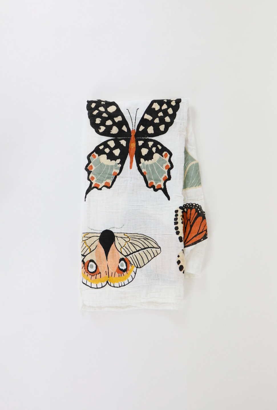 Folded butterfly print baby swaddle blanket, white with black and orange moth-and-butterfly design