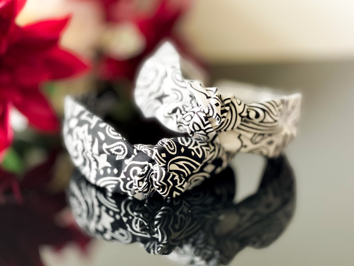 Black and white paisley knot headband, front view