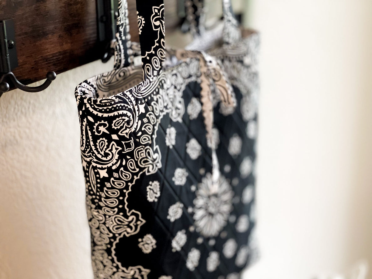 Bandana print book tote bag with black top handles and patterned side panel