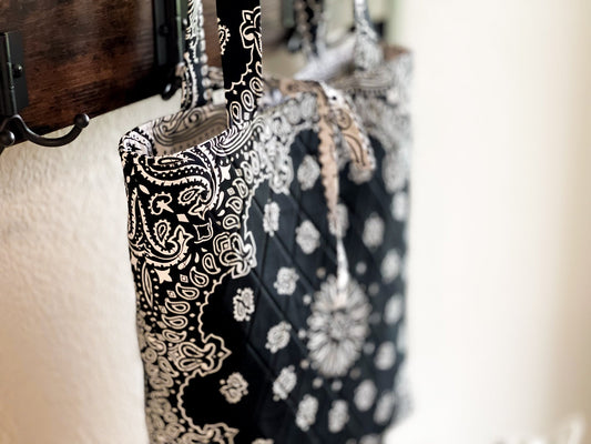 Bandana print book tote bag with black top handles and patterned side panel