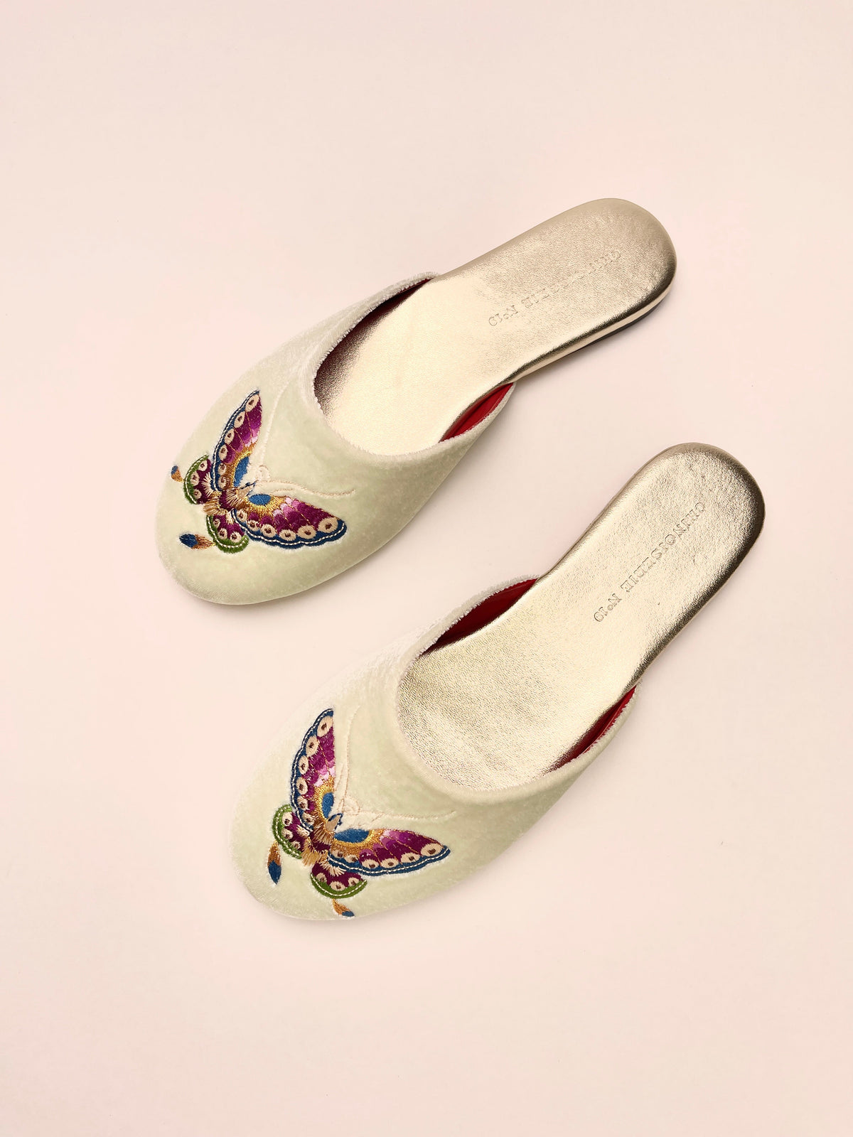 Mint velvet mules with butterfly embroidery, low slip-on heel, red interior
