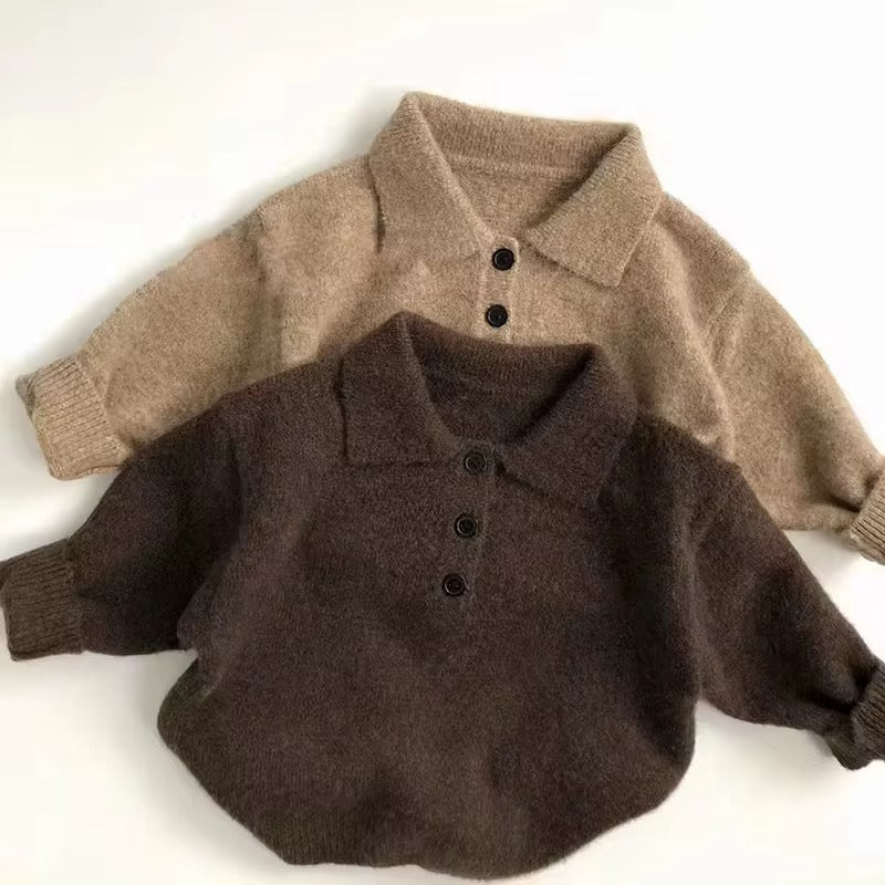 Two toddler knit sweaters: tan and dark brown, each with polo collar and buttons