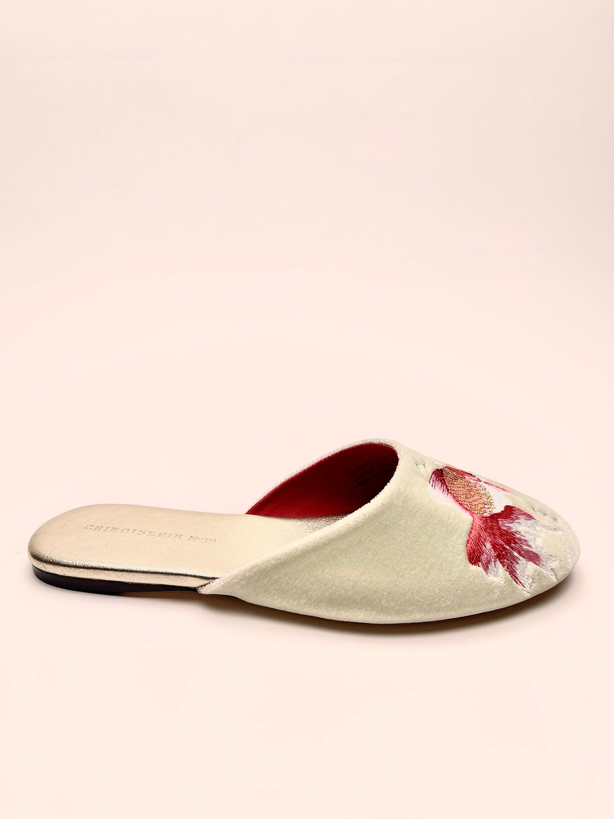 Single mint velvet mule slipper with goldfish embroidery and red-lined interior