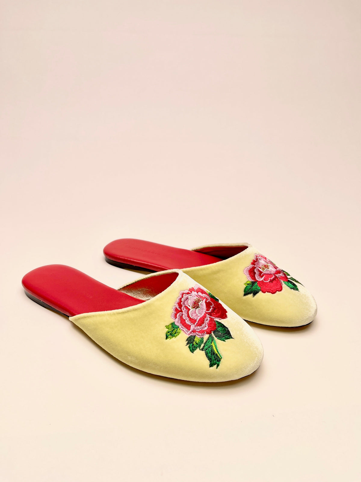 Backless mule slippers in lemon velvet with peony embroidery and red footbed, pair