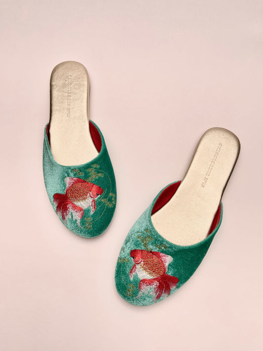 Jade velvet mules showing goldfish embroidery on slip-on uppers