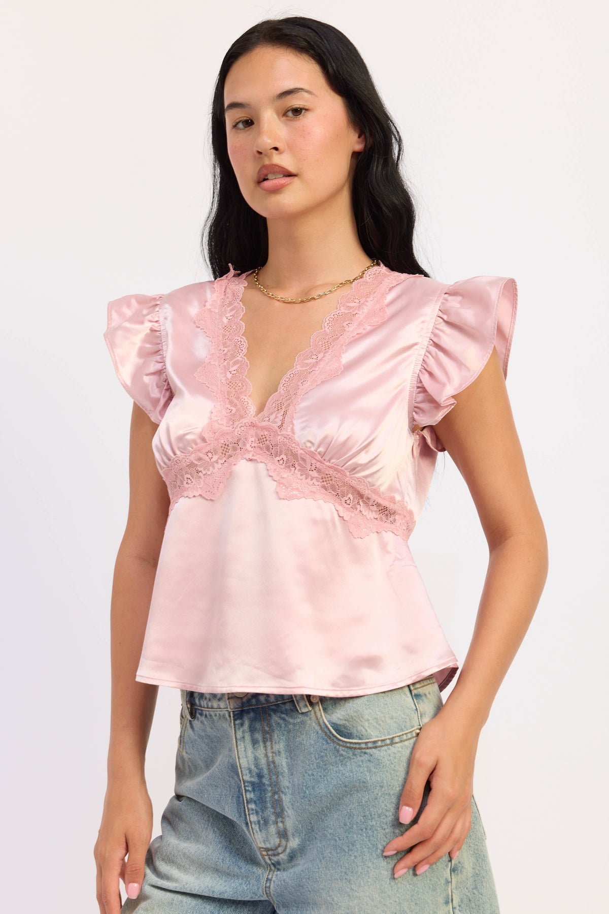Aliza pink satin top with lace V-neck and layered ruffle sleeve details