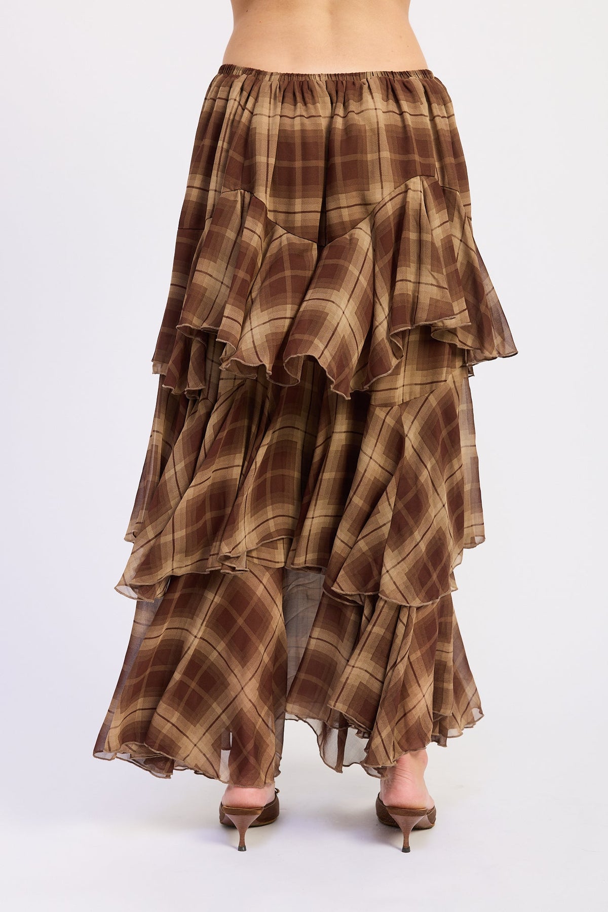 Brown plaid tiered maxi skirt with elastic waist and ruffled tiers