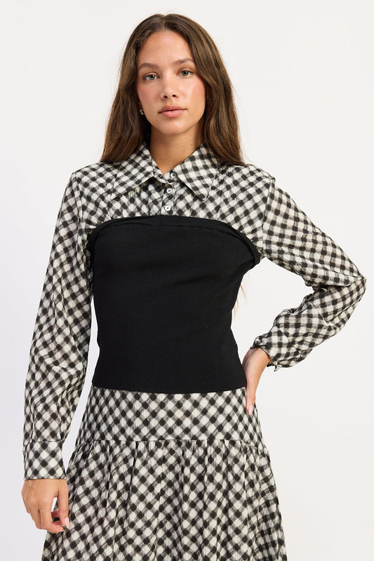 Gingham button-up top with black corset-style bodice panel and long sleeves
