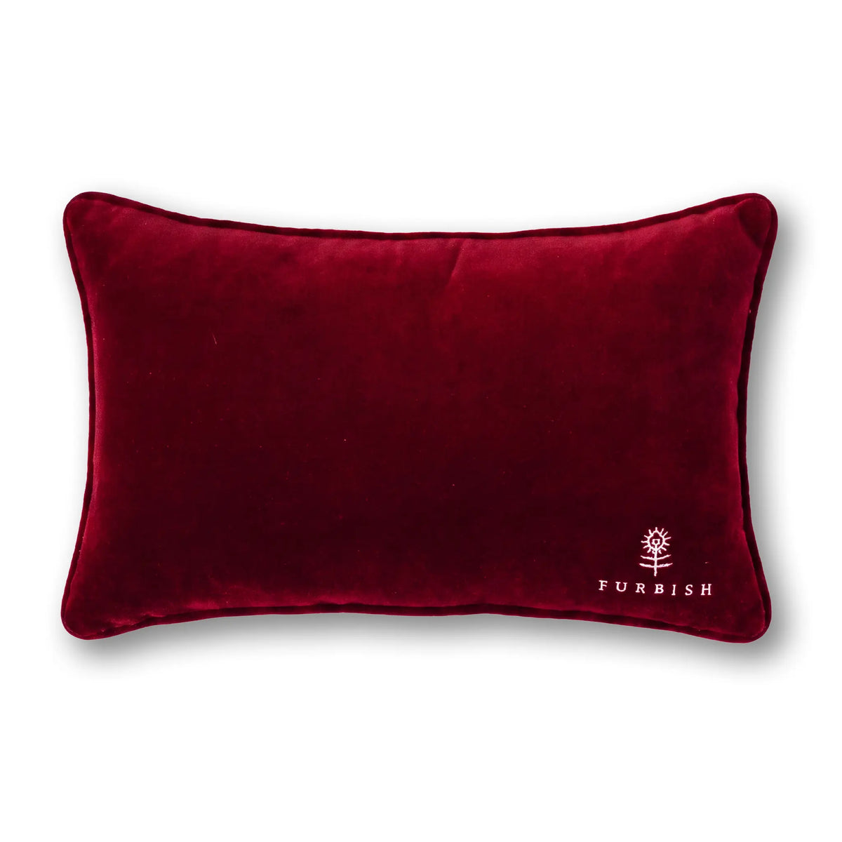 Burgundy velvet pillow back with FURBISH logo