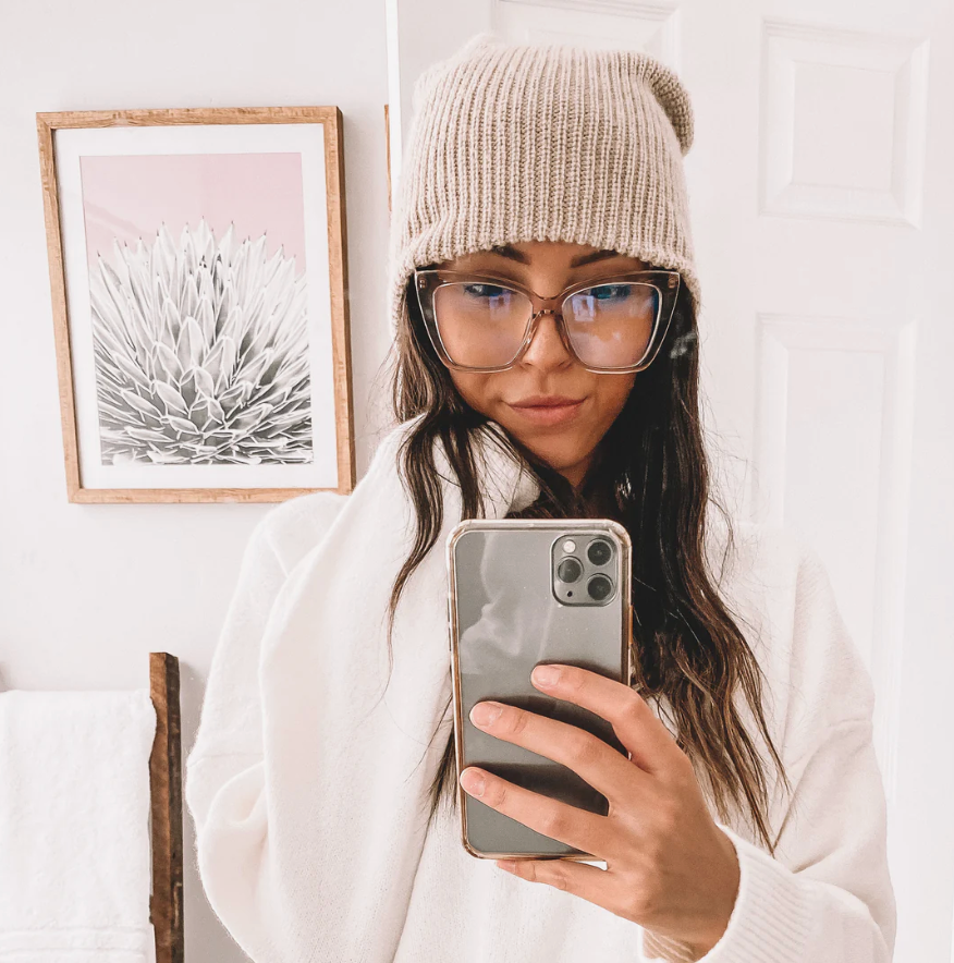 Amber tortoise square glasses with clear lenses, worn in a mirror selfie