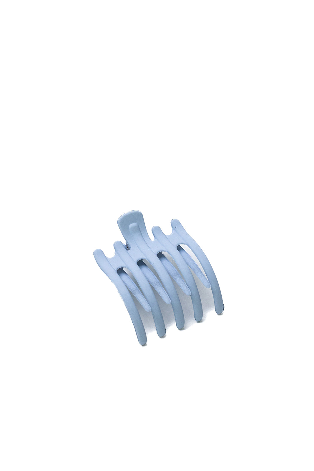 Hair claw clip in light blue with five rounded teeth