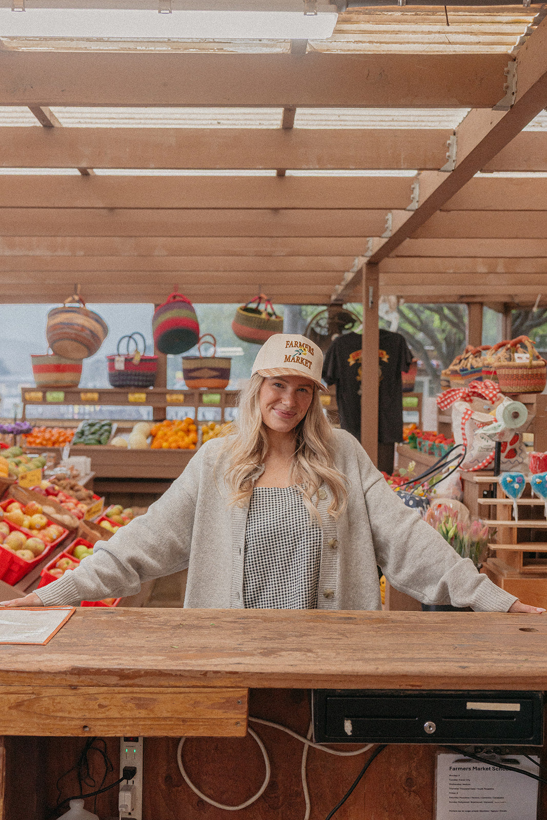 Farmers Market trucker hat with beige crown and orange gingham brim