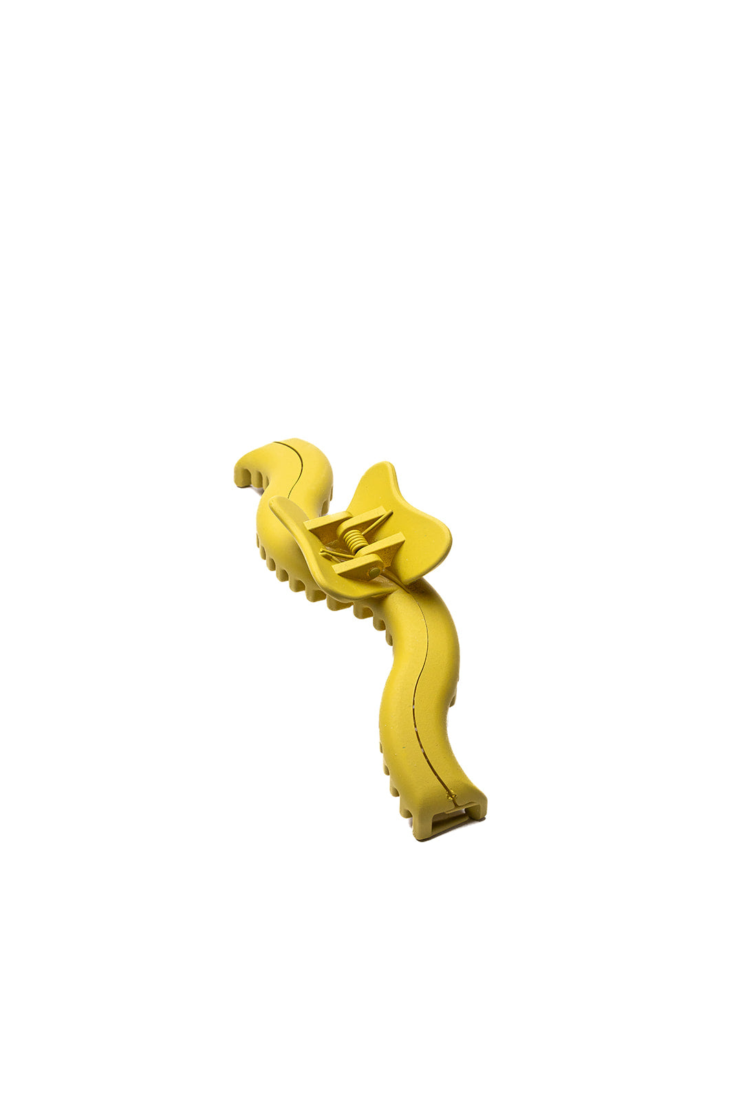 Yellow wavy hair claw on a plain background