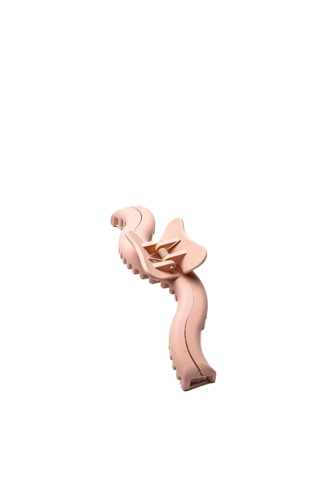 Wavy hair claw clip in light pink, sculpted wave design