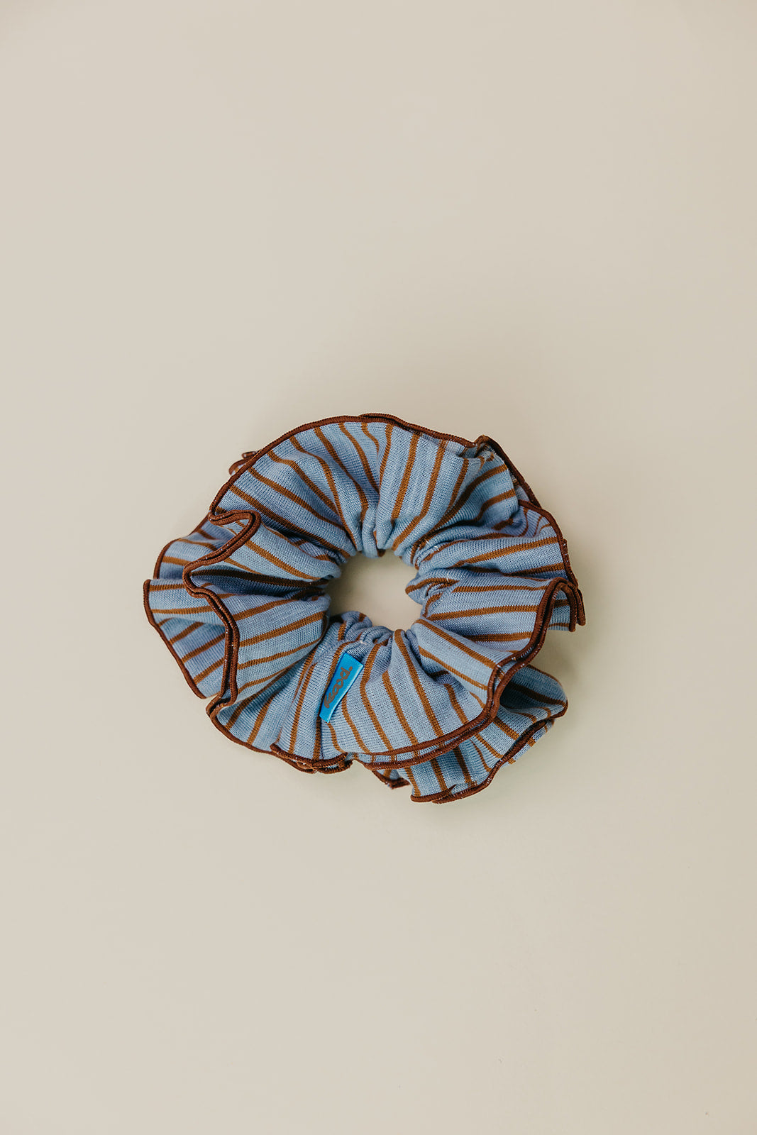 Blue and brown striped corset-style scrunchie rosette with gathered center