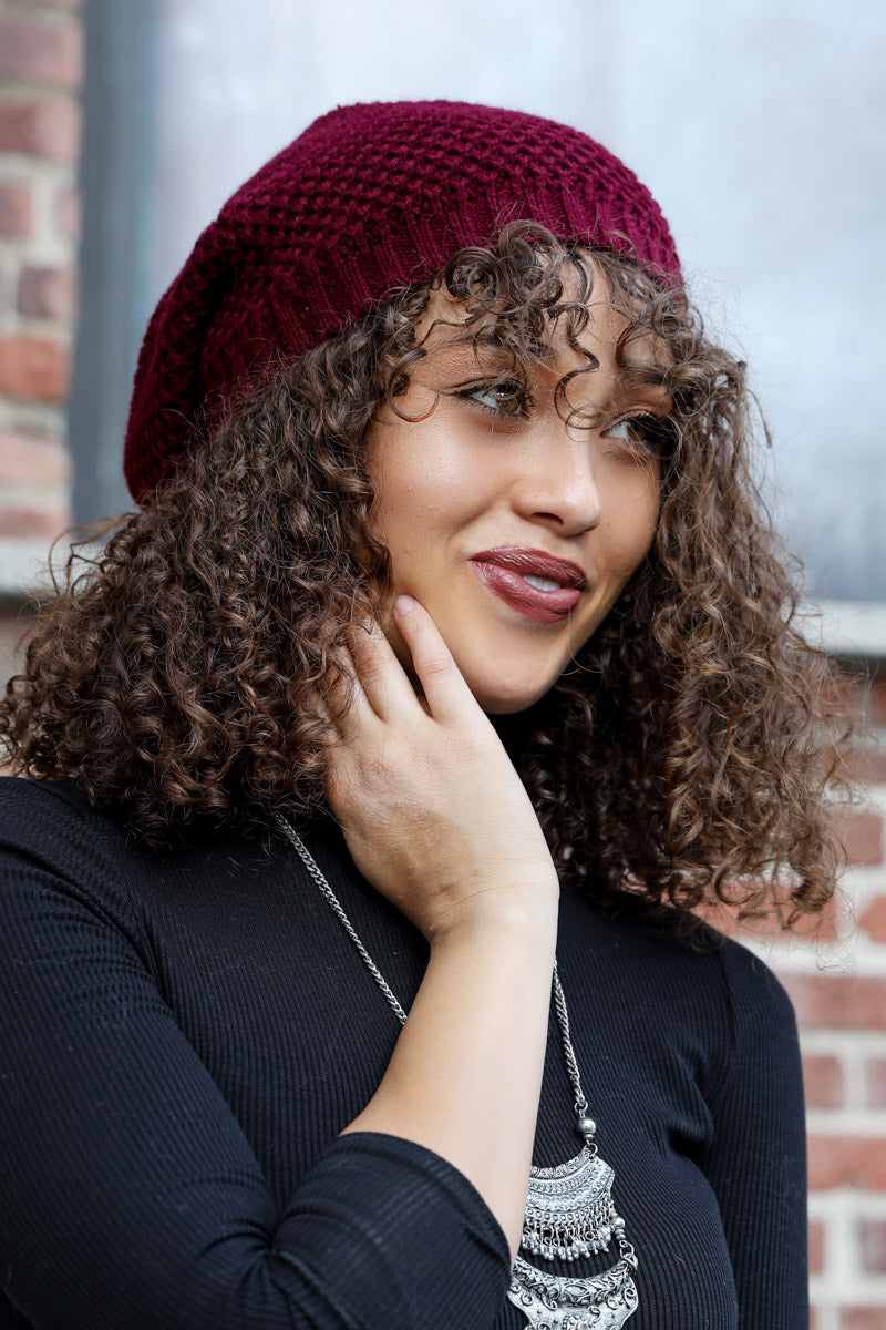 Burgundy waffle-knit slouch beanie with folded cuff