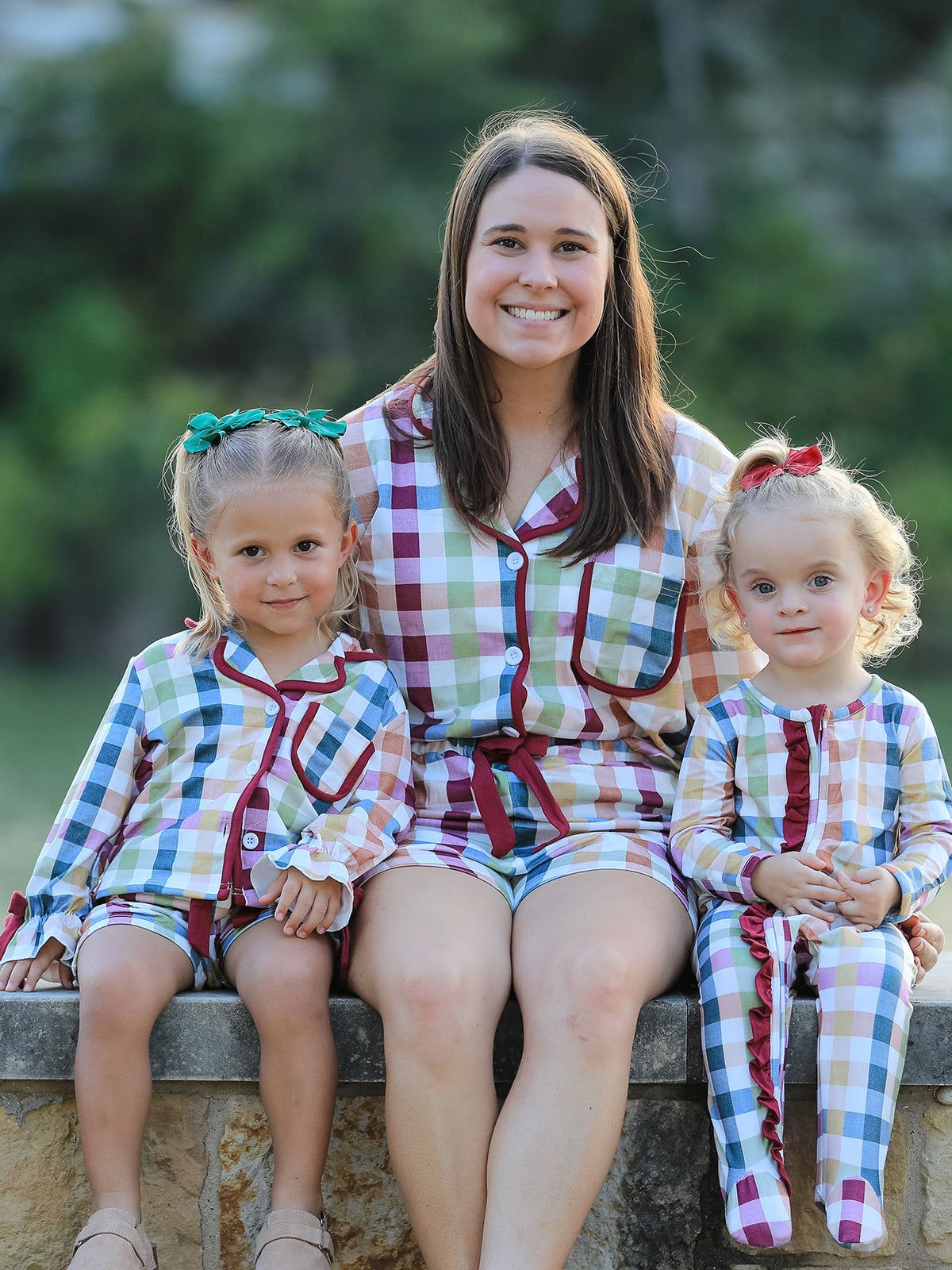 Mom-and-child plaid pajama set, mother seated with two kids in matching outfits