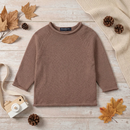 Mocha knit rollneck baby sweater with ribbed neckline and long sleeves