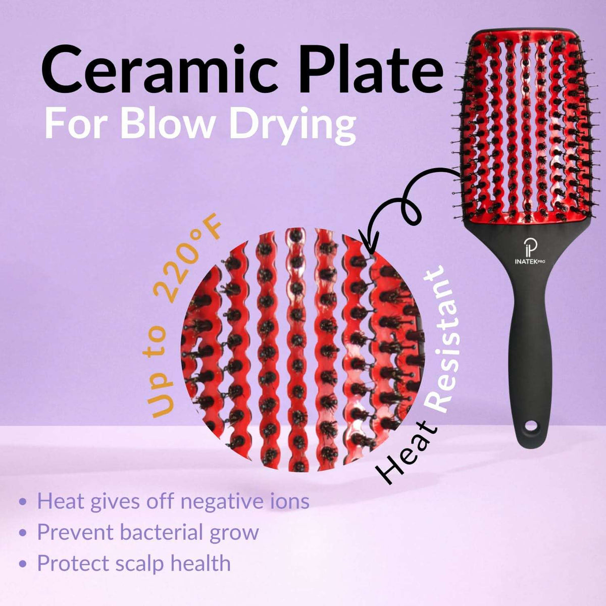 Curved paddle hair brush with red vented boar bristle head and black ergonomic handle