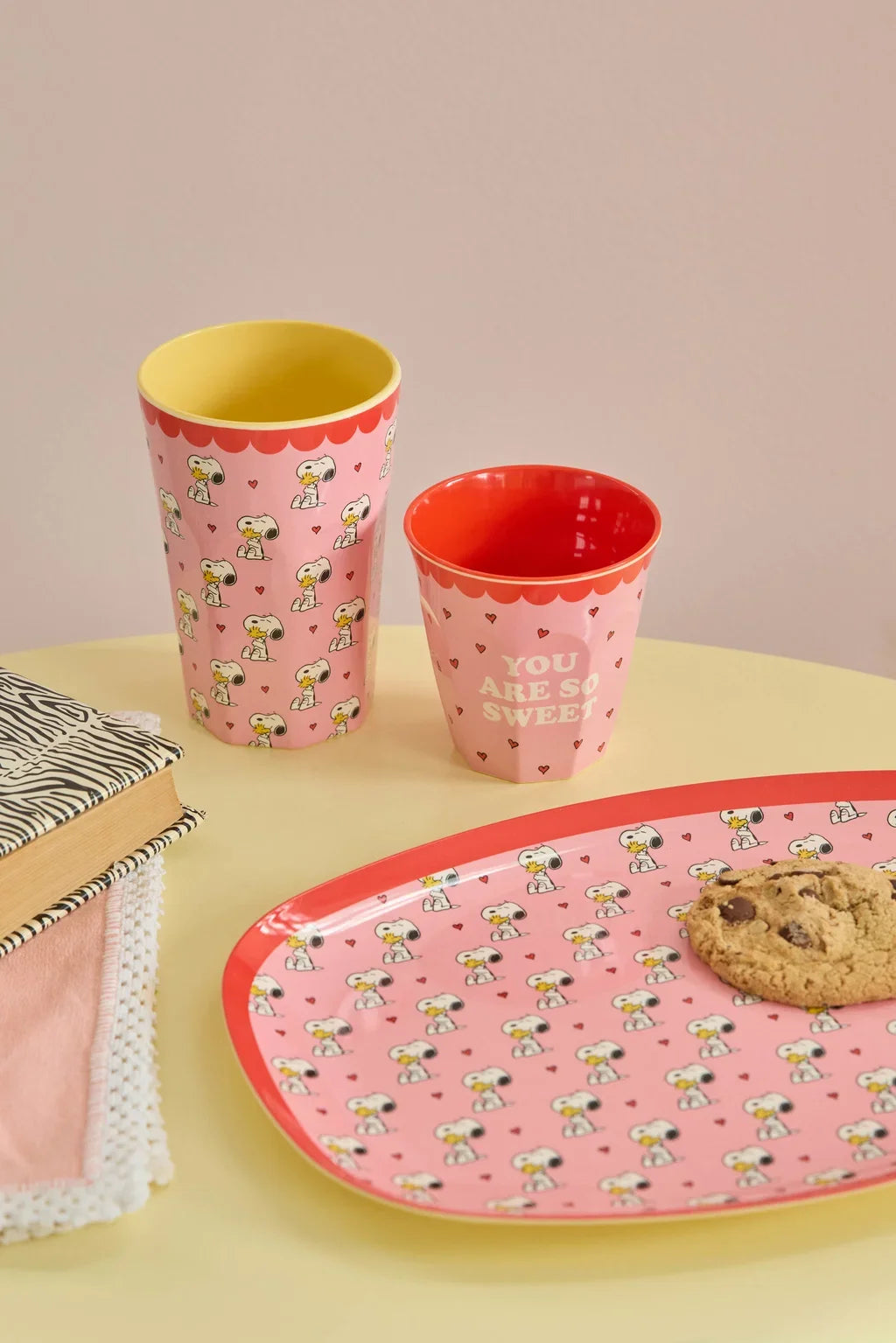 Pink melamine Snoopy cup with red rim, character and heart print