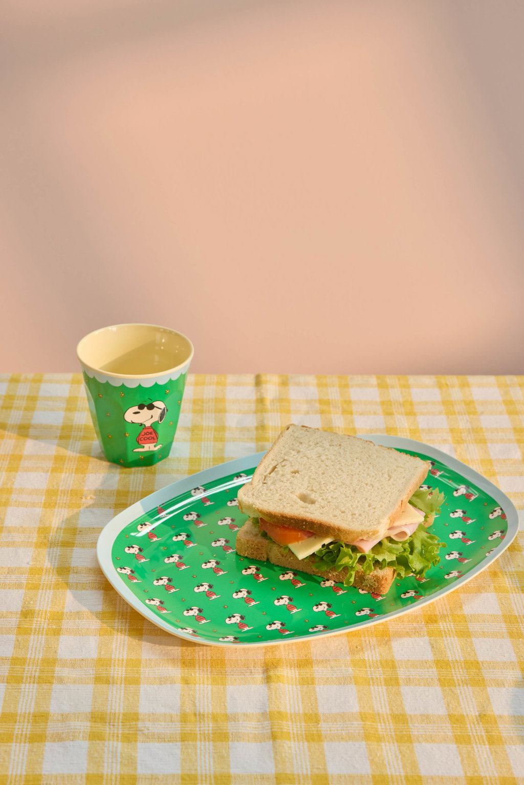 Green Snoopy-print plate with sandwich and matching cup