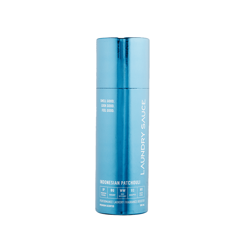 Light blue cylinder laundry scent booster with vertical Laundry Sauce label