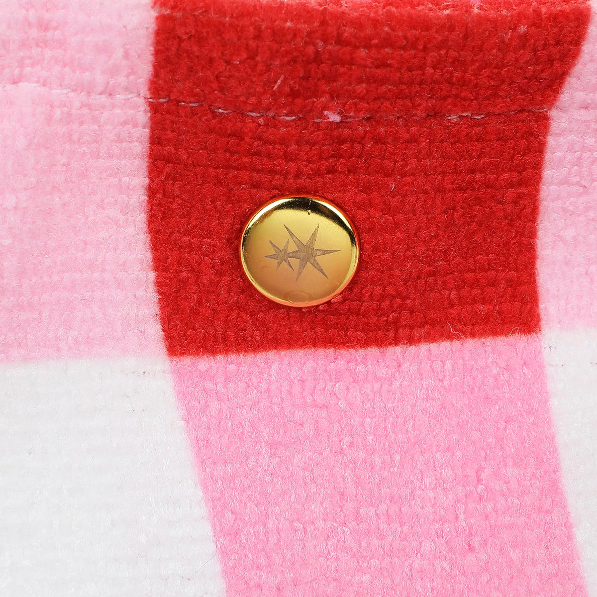 Gold round button closure on red and pink gingham towel tote bag