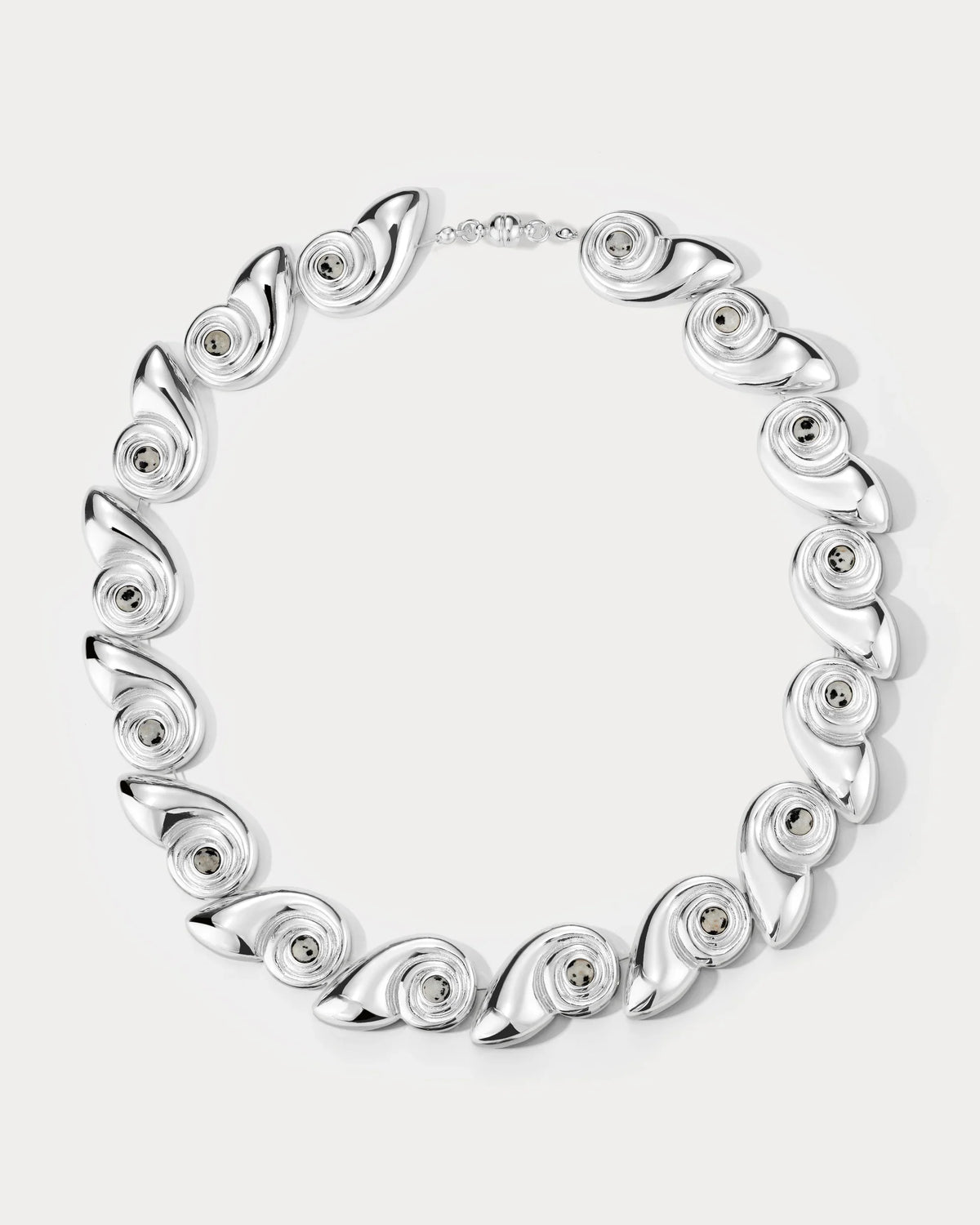 Silver statement necklace with round spiral discs in a linked collar design