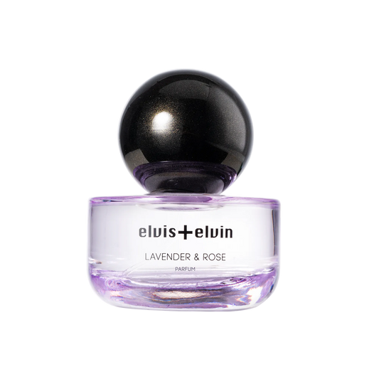 Lavender & Rose perfume bottle with black dome cap and purple glass