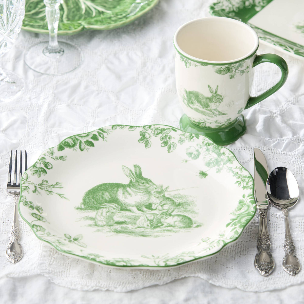 Easter dinner plate with green rabbit illustration and botanical border on white
